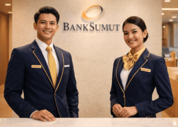Petugas bank yang ramah sedang bersiap melayani nasabah dalam program Lowongan Bank Sumut 2026.