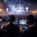 Tim pengelola acara yang sedang berkoordinasi di balik layar panggung megah guna memastikan kelancaran pertunjukan musik besar.