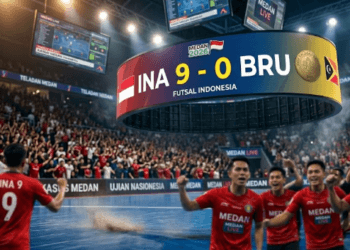 Papan skor digital yang menunjukkan dominasi gol Timnas Futsal Indonesia saat menghadapi Brunei Darussalam.