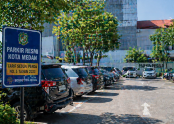 Pengelolaan lahan parkir mandiri yang tertib dan memenuhi aturan Pajak Parkir Medan demi kenyamanan pengguna.