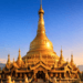 Kemegahan Pagoda Emas di Taman Alam Lumbini Berastagi yang dikelilingi taman bunga asri.