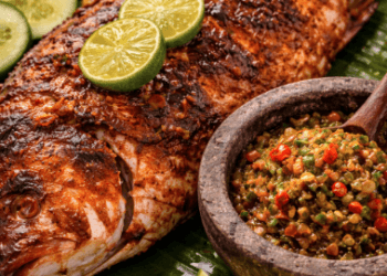 Sajian Ikan Bakar Belawan yang menggunakan bumbu rempah pilihan dan disajikan bersama sambal andaliman yang pedas dan getir.