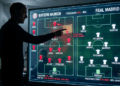 Papan taktik digital yang menunjukkan pergerakan pemain Bayern Munchen dalam membongkar pertahanan Real Madrid.