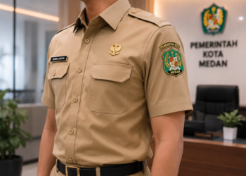Penerapan standar Baju Dinas Medan guna menciptakan keseragaman dan profesionalitas dalam identitas visual aparatur di lingkungan pemerintah kota pimpinan.