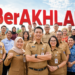 Poster sosialisasi Budaya Kerja BerAKHLAK yang mencakup orientasi pelayanan, akuntabel, kompeten, harmonis, loyal, adaptif, dan kolaboratif bagi ASN pimpinan.