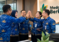 Kolaborasi antar instansi melalui penguatan Etos Kerja Medan yang mengedepankan integritas dan orientasi pelayanan demi kemajuan kota pimpinan.