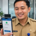 Ilustrasi ASN yang menerima notifikasi pencairan Gaji ke-13 ASN 2026 melalui aplikasi perbankan.