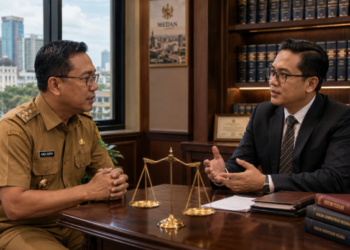 Penggunaan aplikasi Absen ASN Medan berbasis lokasi untuk menjamin akurasi kehadiran dan meningkatkan kedisiplinan aparatur di lingkungan pemerintah kota pimpinan.