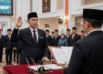 Prosesi pengambilan Ikrar ASN Medan sebagai bentuk komitmen moral dan hukum bagi setiap pegawai yang resmi diangkat menjadi abdi negara pimpinan.