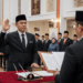 Prosesi pengambilan Ikrar ASN Medan sebagai bentuk komitmen moral dan hukum bagi setiap pegawai yang resmi diangkat menjadi abdi negara pimpinan.