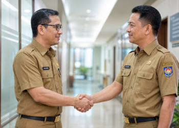 Ilustrasi penerapan Moral ASN Medan yang mengedepankan sikap saling menghormati dan profesionalisme antar sesama aparatur pemerintah pimpinan.