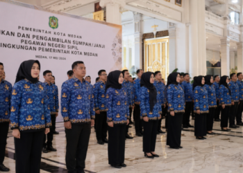 Prosesi khidmat Pengangkatan ASN Medan yang menandai dimulainya masa pengabdian secara resmi bagi aparatur sipil negara di lingkungan pemerintah kota pimpinan.