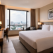 Tampilan kamar yang nyaman di salah satu hotel murah Medan untuk wisatawan