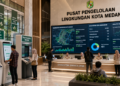 Dashboard interaktif Aplikasi Cepat Izin Lingkungan yang menampilkan sistem pemantauan data ekosistem real-time untuk mendukung efisiensi lingkungan kota Medan