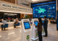 Dashboard interaktif Sistem Maju Izin Perdagangan yang menampilkan sistem pemantauan data niaga real-time untuk mendukung efisiensi perdagangan kota Medan