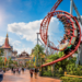 Keseruan para pengunjung saat mencoba wahana roller coaster yang menantang di salah satu taman hiburan di Medan yang populer